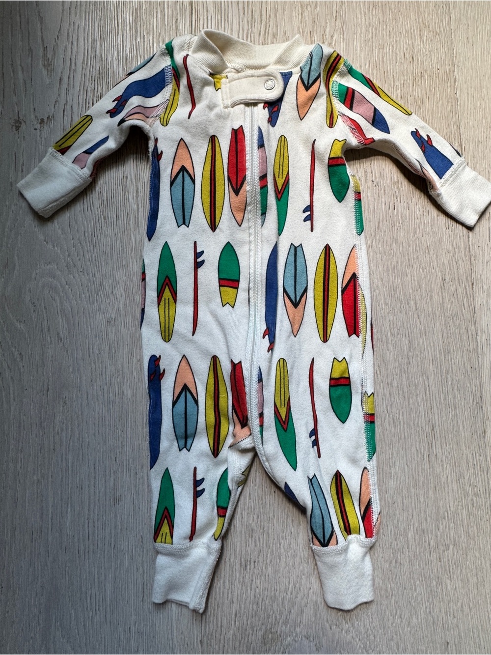 Hanna Andersson White One-Piece Footie with Colorful Surfboard Print
